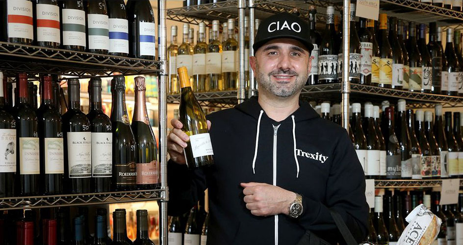 Co-owner of Bottega Nicastro, Pat Nicastro, stands in the wine section of his salad restaurant, Lollo, in the Byward Market. PHOTO BY JULIE OLIVER /Postmedia